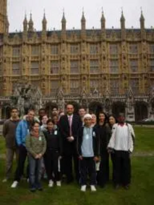 Parmjit Singh Gill MP with some young people from his constituency outside the Houses of Parliament