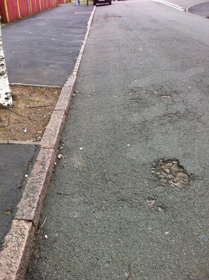 Series of Potholes Reported to Leicester City Council on Broughton Road junction with Melland Place, Freemen Ward