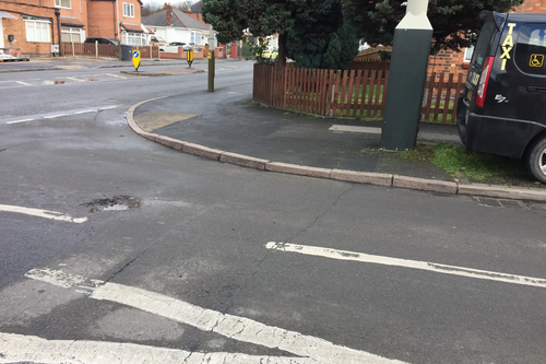 Deep Dale in Evington Ward. Liberal Democrats reported to Leicester City Council the pothole forming at the junction with the busy Green Lane Road