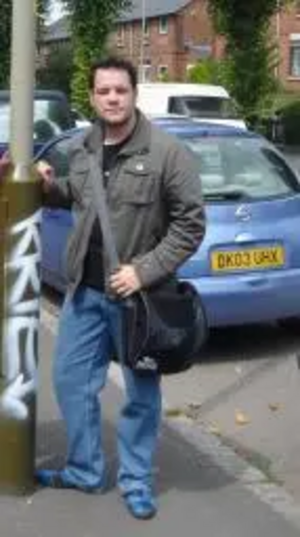 Allan Macaffery inspects another vandalised lampost on Kington Lane East.