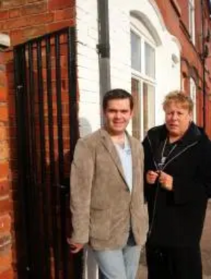 Cllr Mark Farmer, Lib Dem Cabinet member for Crime and Disorder with Cllr Phyllis Green inspect newly installed alley gates in the Fosse Ward