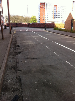 Grasmere Street, Castle Ward at the junction of Mill Lane. Appalling carriageway