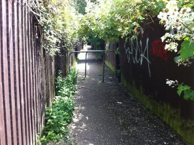 Graffiti and Overgrown; the path linking Caversham Road and the Hillsborough Road Park