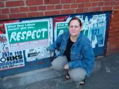 Debbie inspects illegal flyposting by the Respect Party